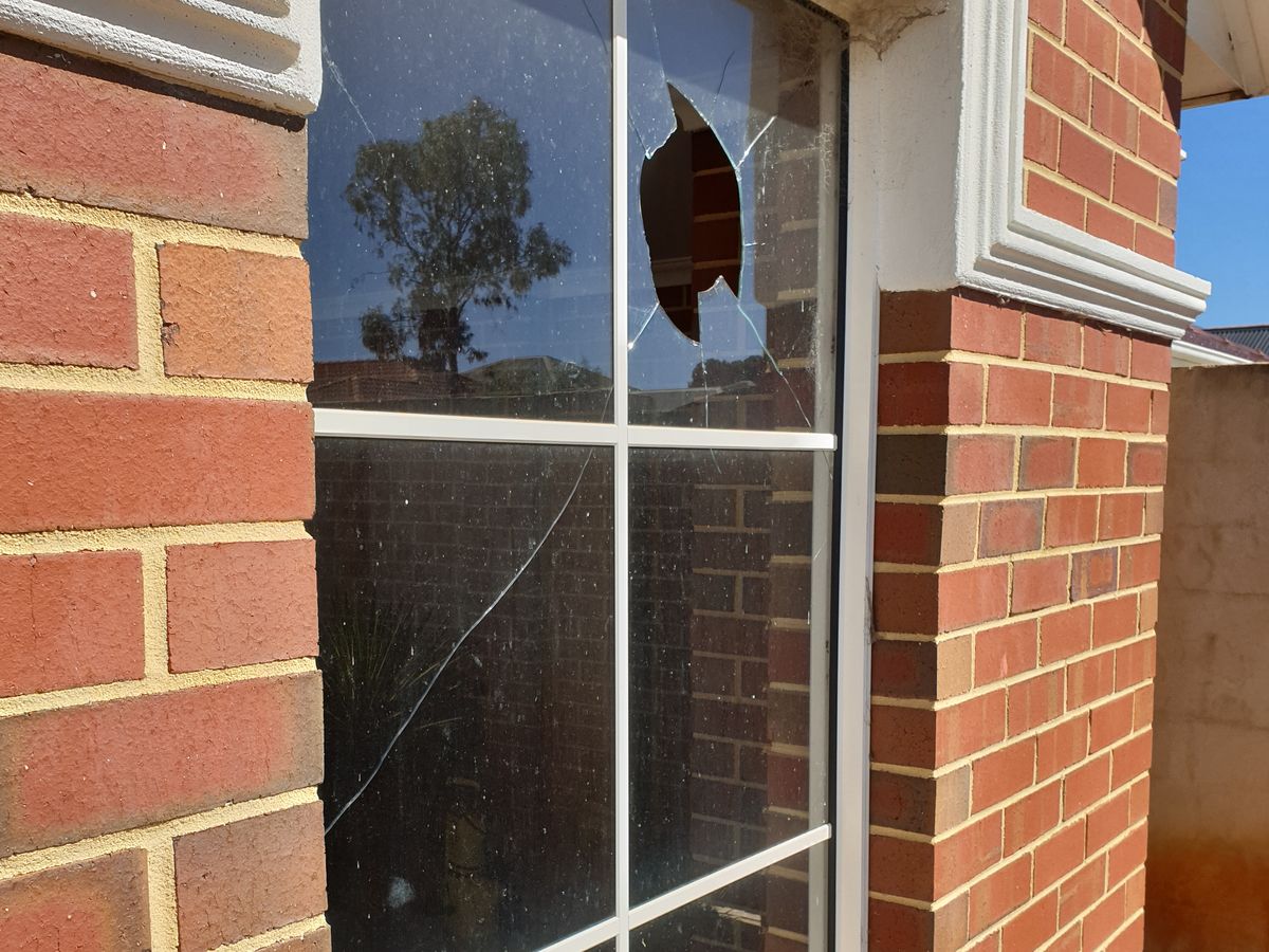 Feature window pane with impact hole — Ellenbrook, before