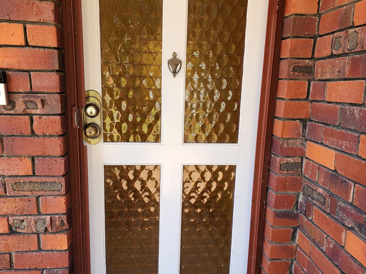 Front door with old amber patterned glass — Greenwood, before