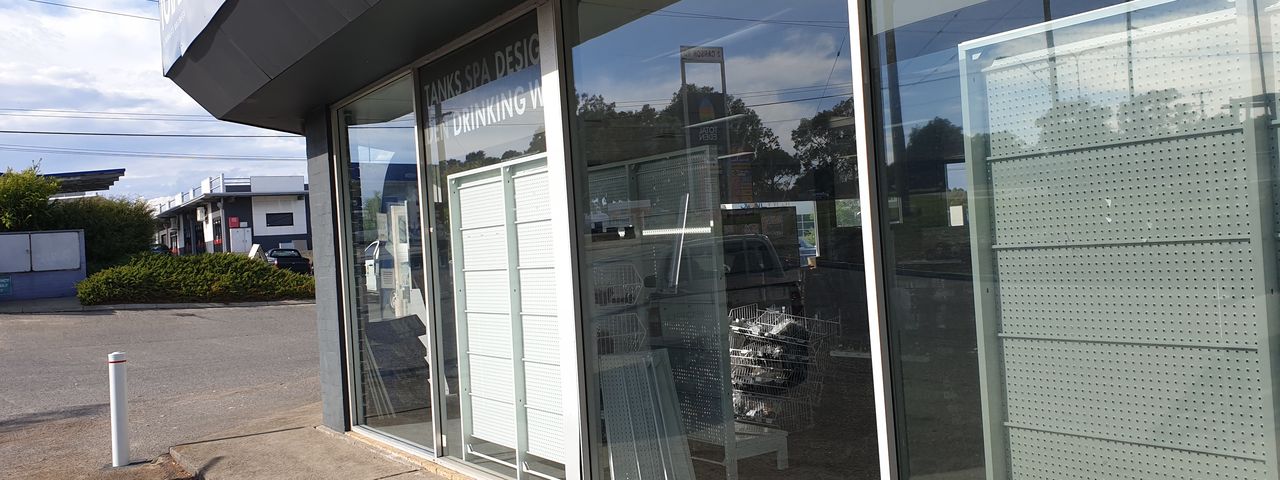 Reglazed commercial shopfront — Total Eden, after