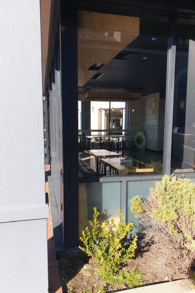 Reglazed shopfront corner — Zambrero, after